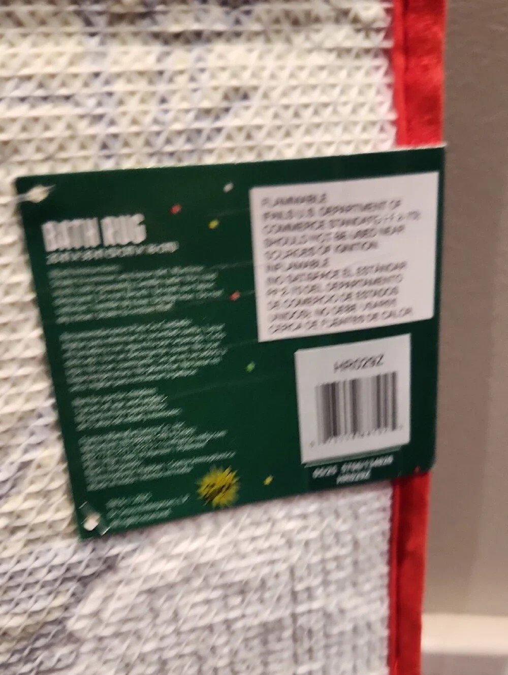 Dr. Seuss The Grinch White & Red Plush Bath Mat with Yellow Motif